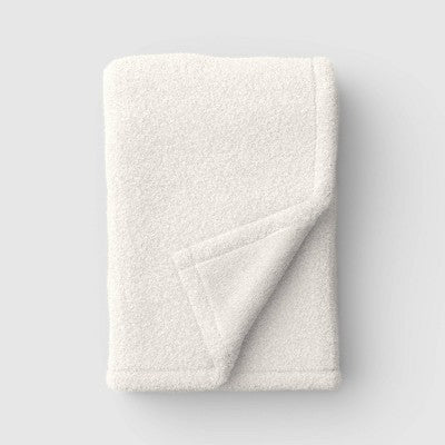 50"x70" Solid Comfort Plush Throw Ivory - Room Essentials