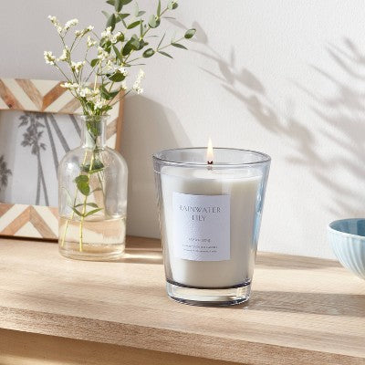12.6oz Rainwater Lily & Peach Scented Candle with Glass Vase & Dustcover - Threshold: Palm Wax, 52hr Burn Time