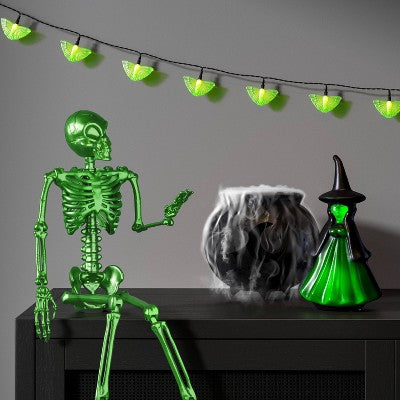 24" Poseable Alien Skeleton Halloween Decorative Prop Ghoulish Glow Green - Hyde and EEK! Boutique