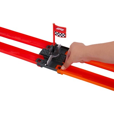 Hot Wheels Racing Formula 1 Grid Start Track Set and 2 Die-Cast F1 Cars in 1:64 Scale