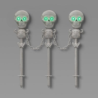 49" Skeletons Fence Stakes Halloween Decorative Prop Off-White - Hyde and EEK! Boutique (LOCAL PICKUP ONLY)