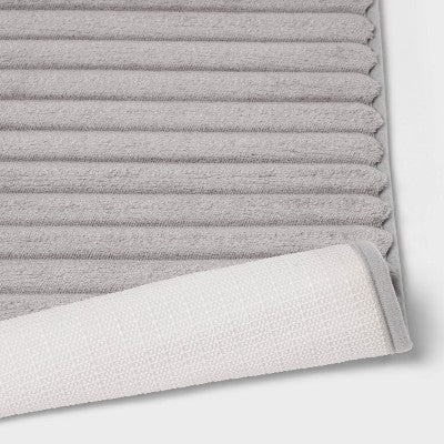 17"x24" Ribbed Cushion Foam Bath Rug Light Gray - Room Essentials