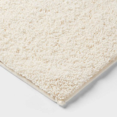 20"x34" Performance Plus Plush Non Skid Bath Rug Cream - Threshold