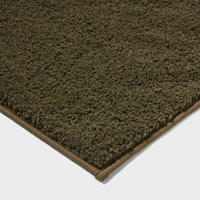 20"x34" Performance Plus Plush Non Skid Bath Rug Dark Green - Threshold